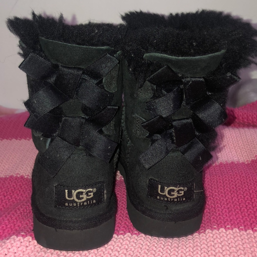 Black UGGS boots with bows on back